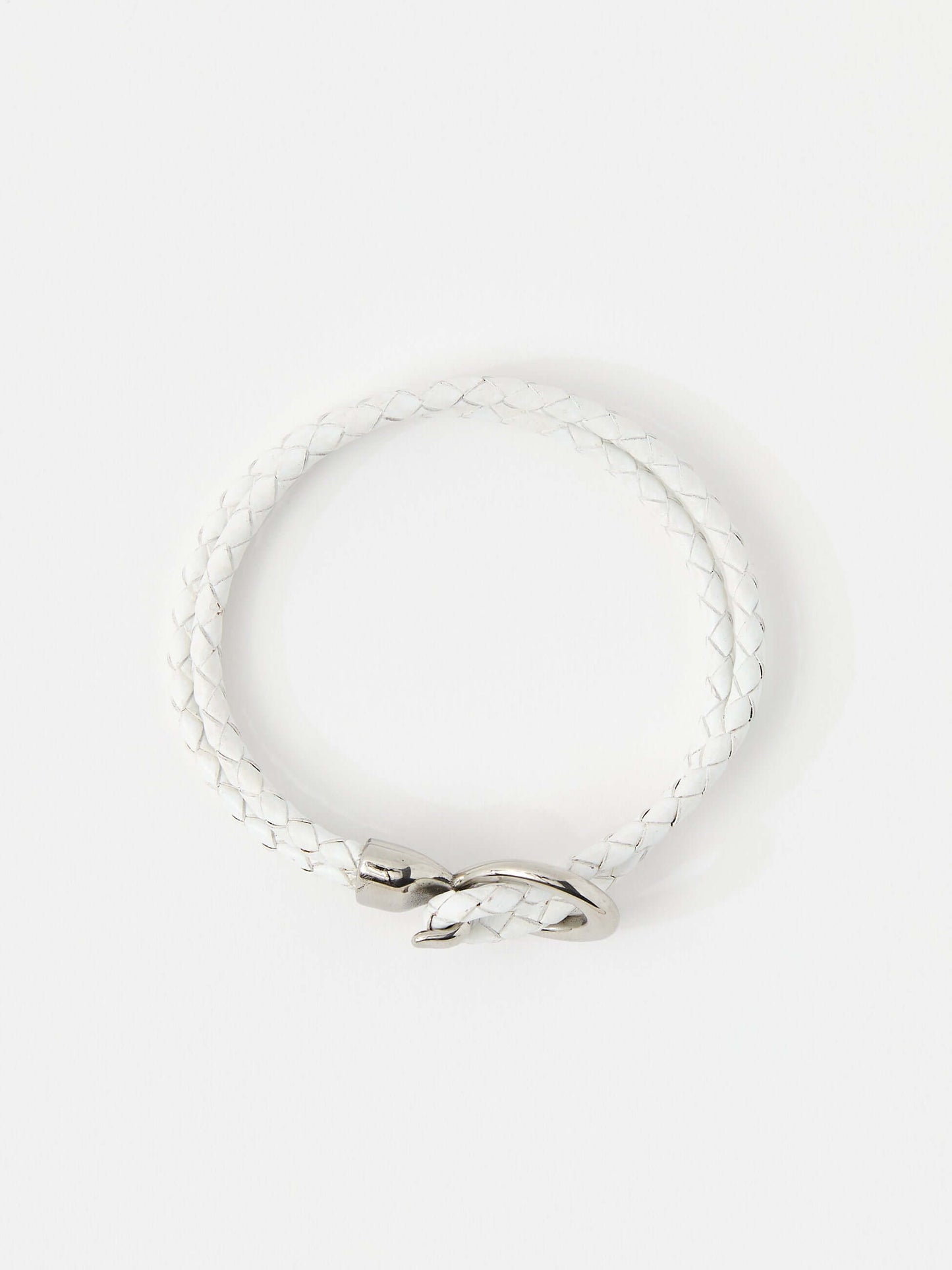 White braided leather bracelet with a sleek silver loop and knot clasp, showcasing a modern and minimalist style.