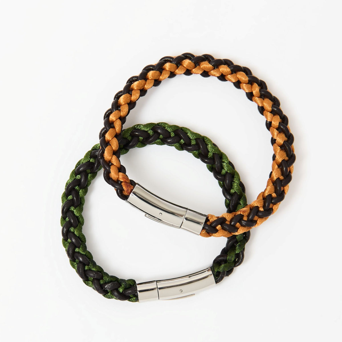 The Soren bracelet in Burnt Amber and Forest Green, flat lay