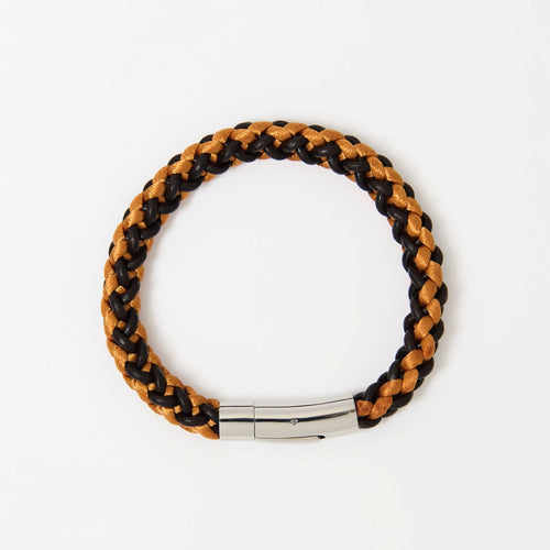 The Soren men's braided leather bracelet in Burnt Amber, flat lay