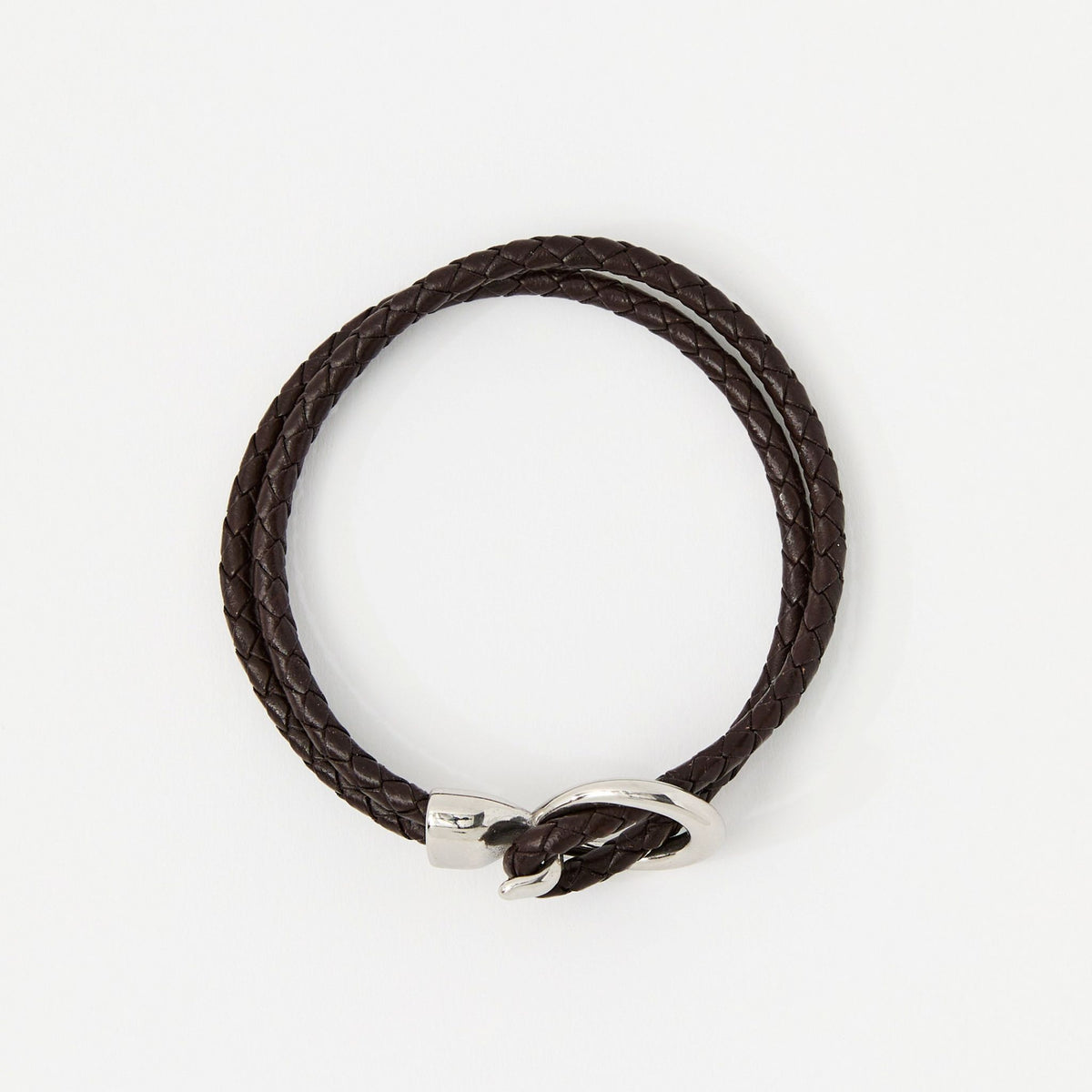 The Merle double-wrap braided leather bracelet in Chestnut Brown, flat lay