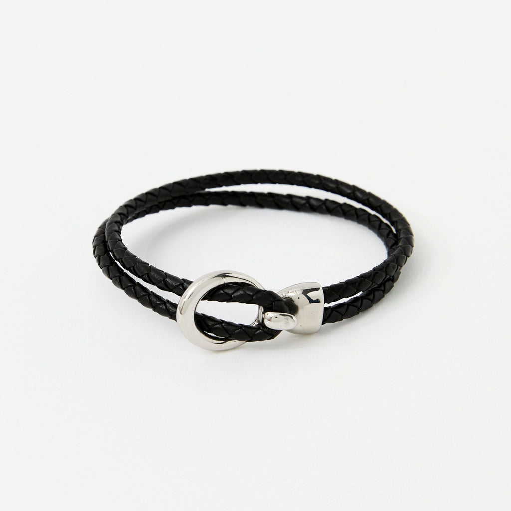 The Merle double-wrap braided leather bracelet in Midnight Black, flat lay