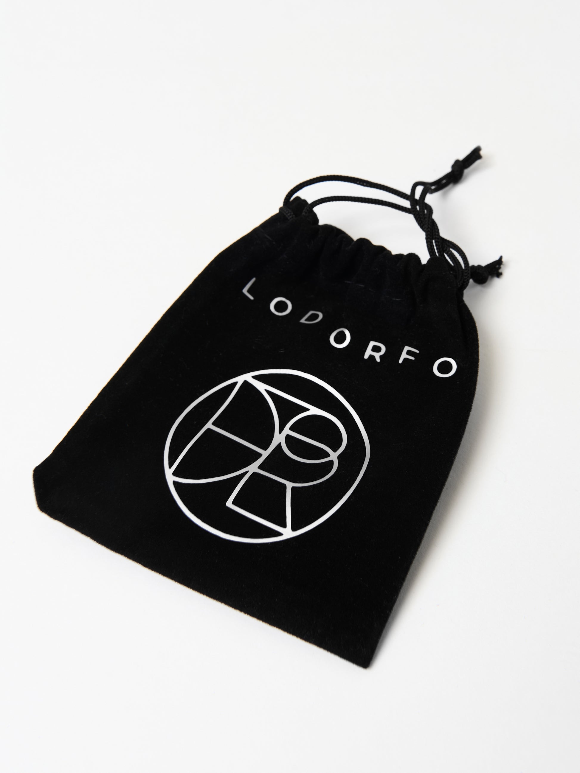 A black drawstring pouch with the Lodorfo logo, displayed on a white background.