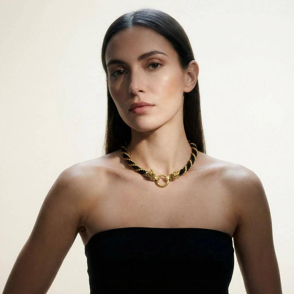 Model wearing statement necklace with satin braided cord, and finished with dragon head clasp, handmade UK