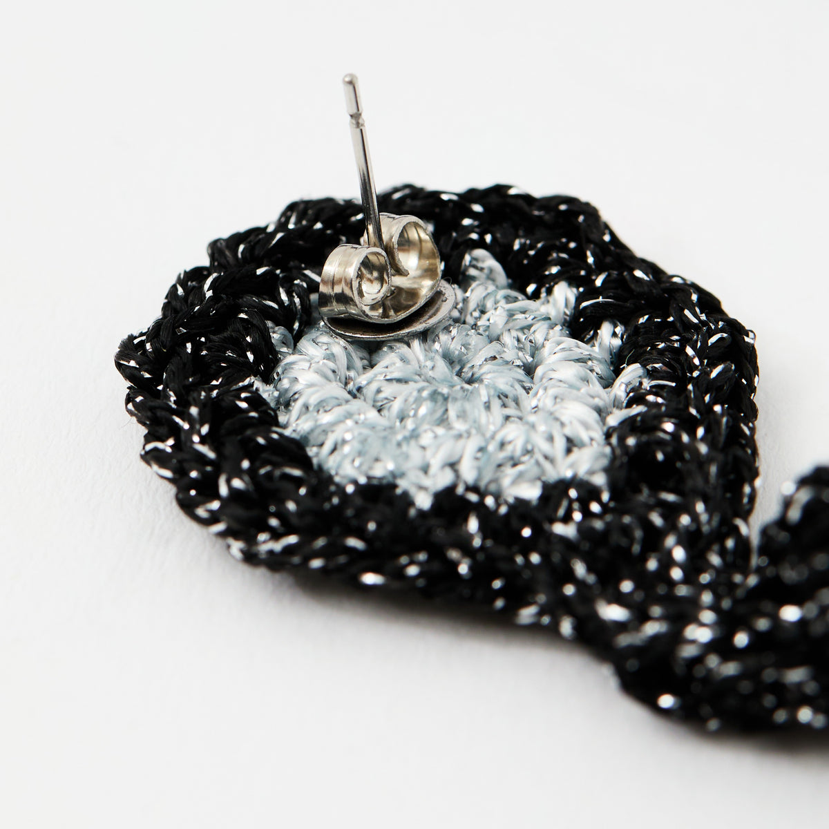 The Noire crochet drop earrings with a silver-grey centre, back view with stud - Lodorfo