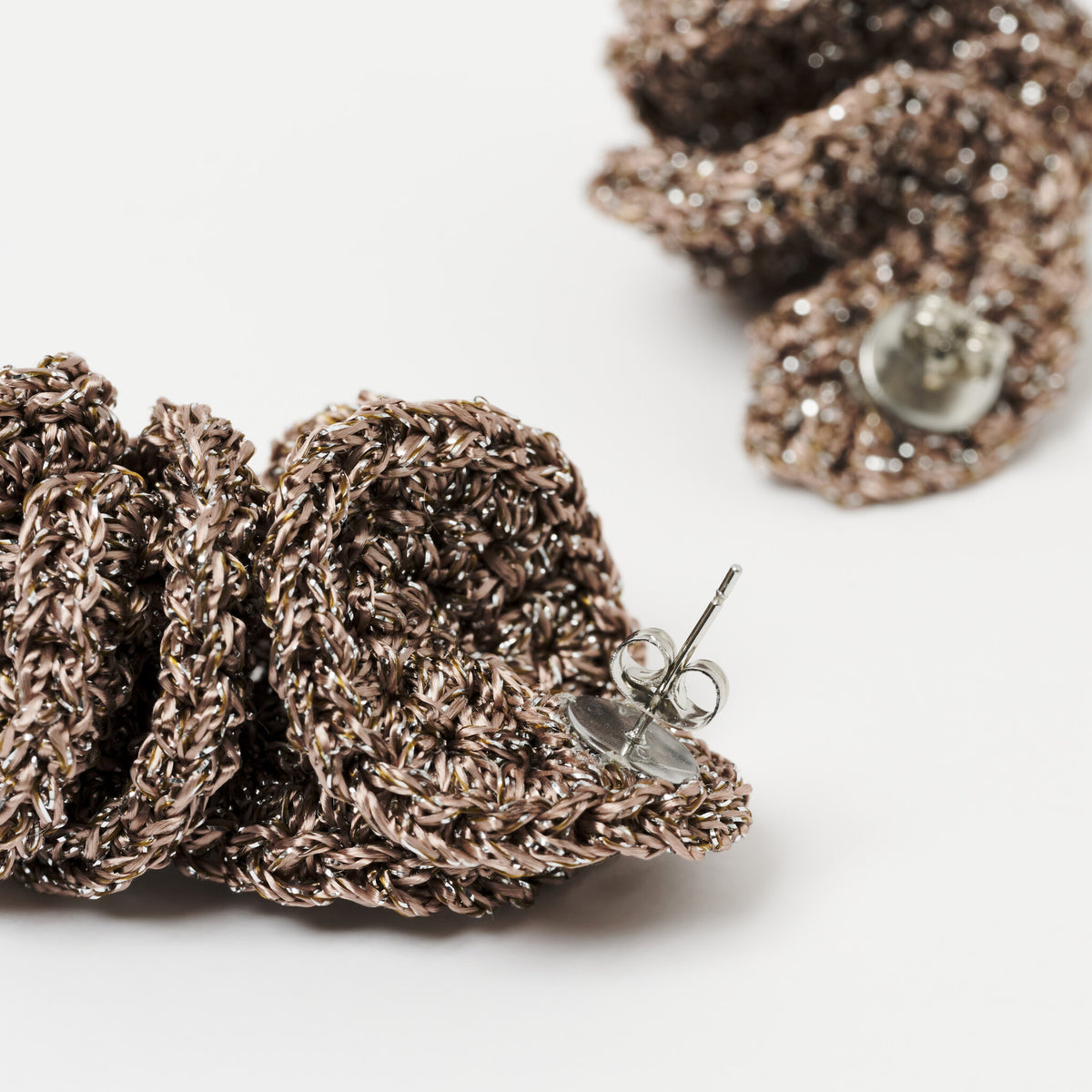 The Elara spiral drop earrings in Fawn with silver shimmer, back view with stainless steel stud - Lodorfo