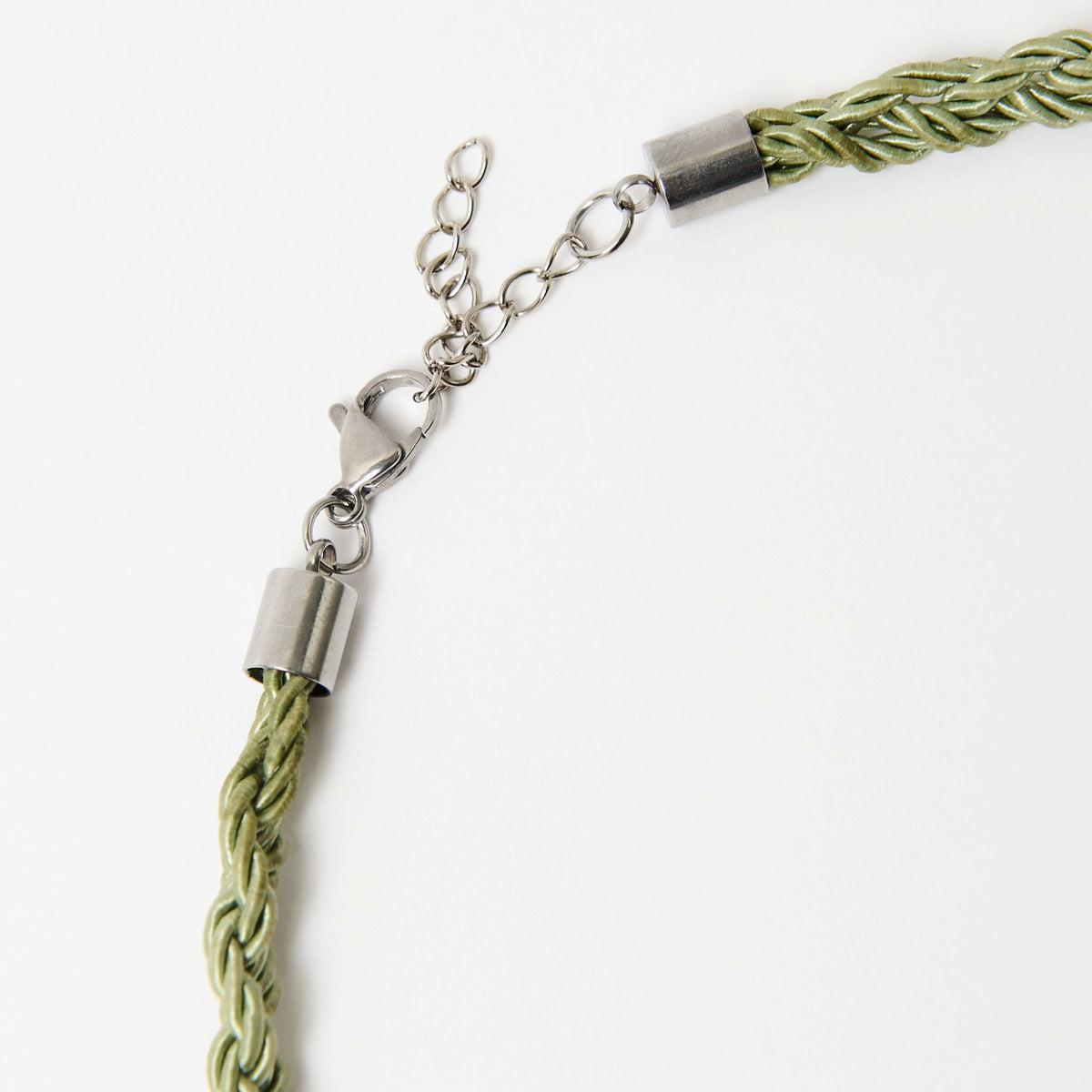 Close-up of the Luma silver lobster clasp and extender chain on a sage green plaited cord - Lodorfo