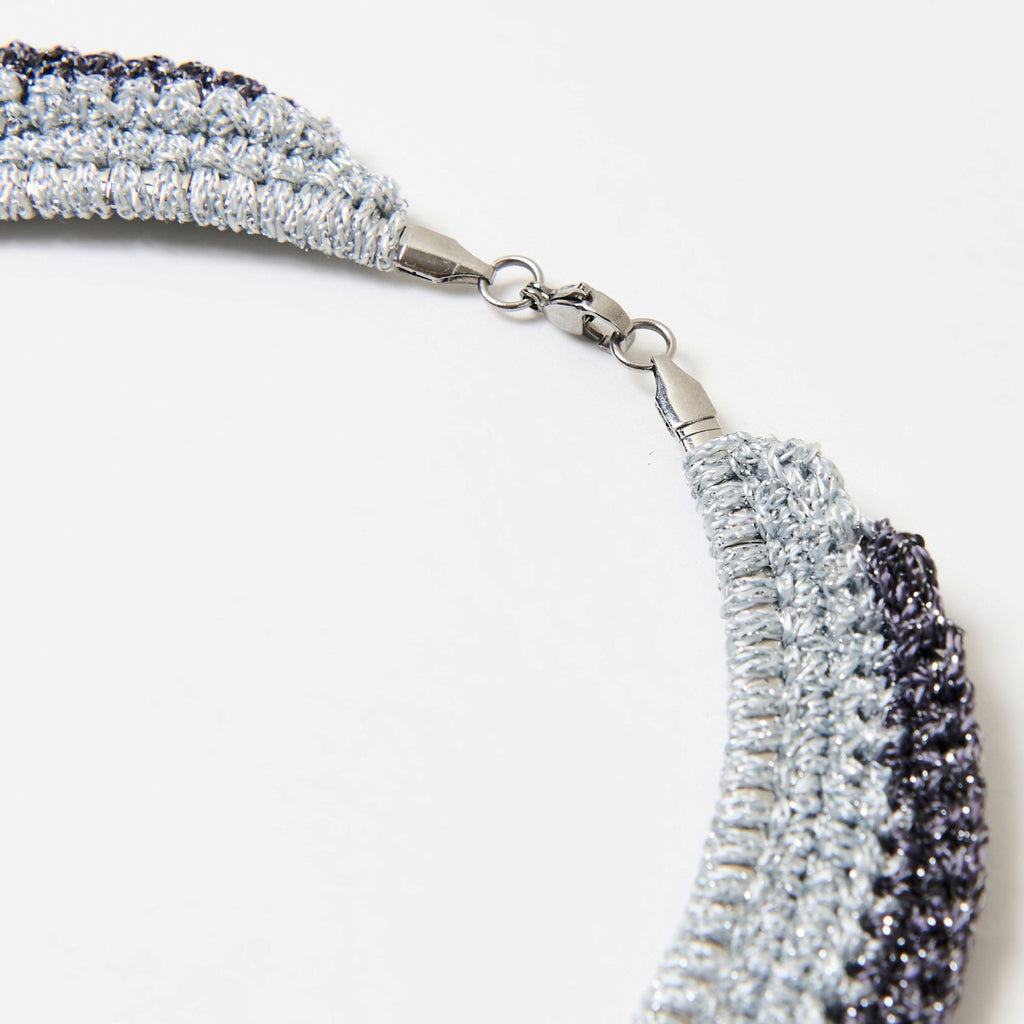 Close-up of the Vetra silver mist crochet collar and silver clasp - Lodorfo