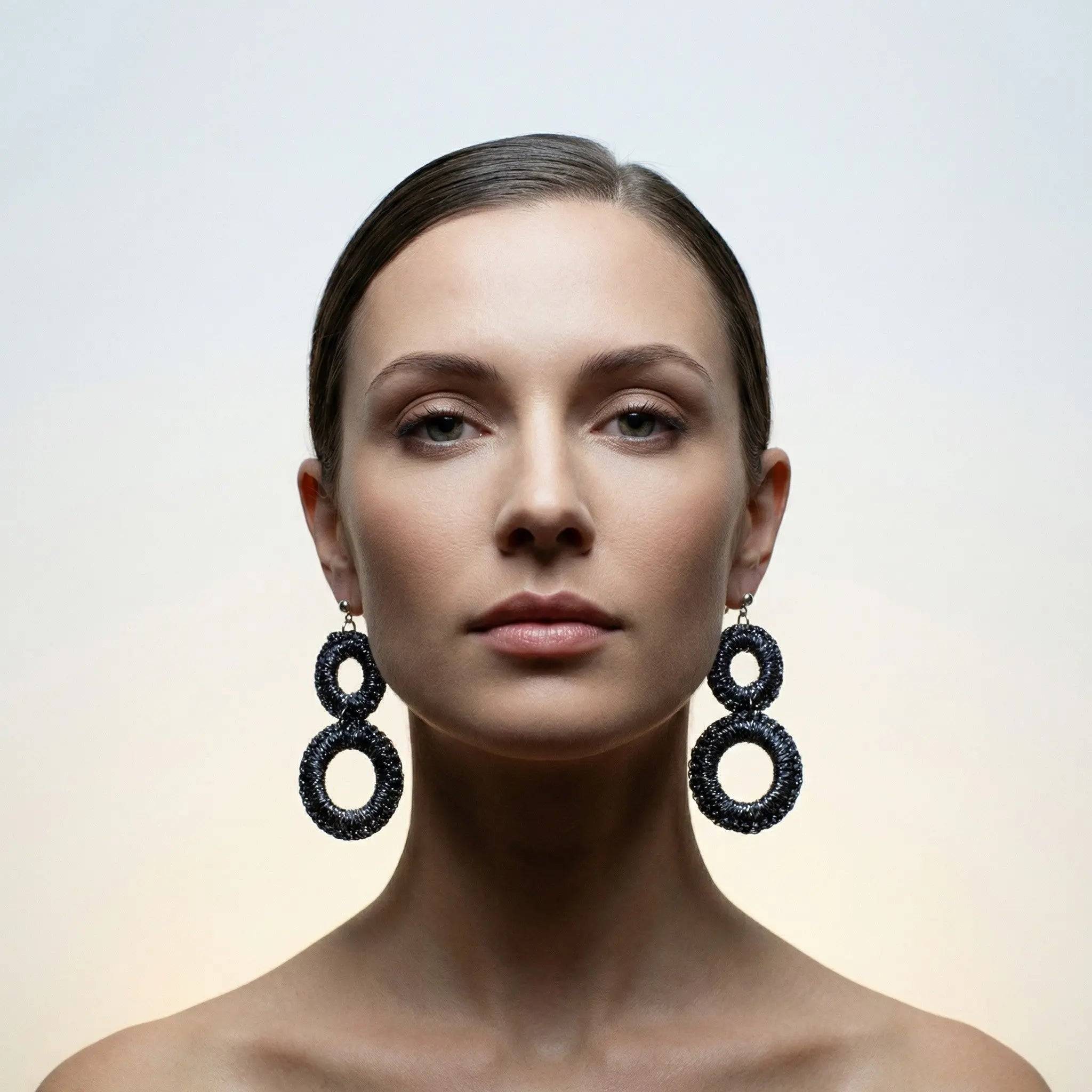 Grey boho ring earrings, shown on model - handmade textile statement jewellery, UK