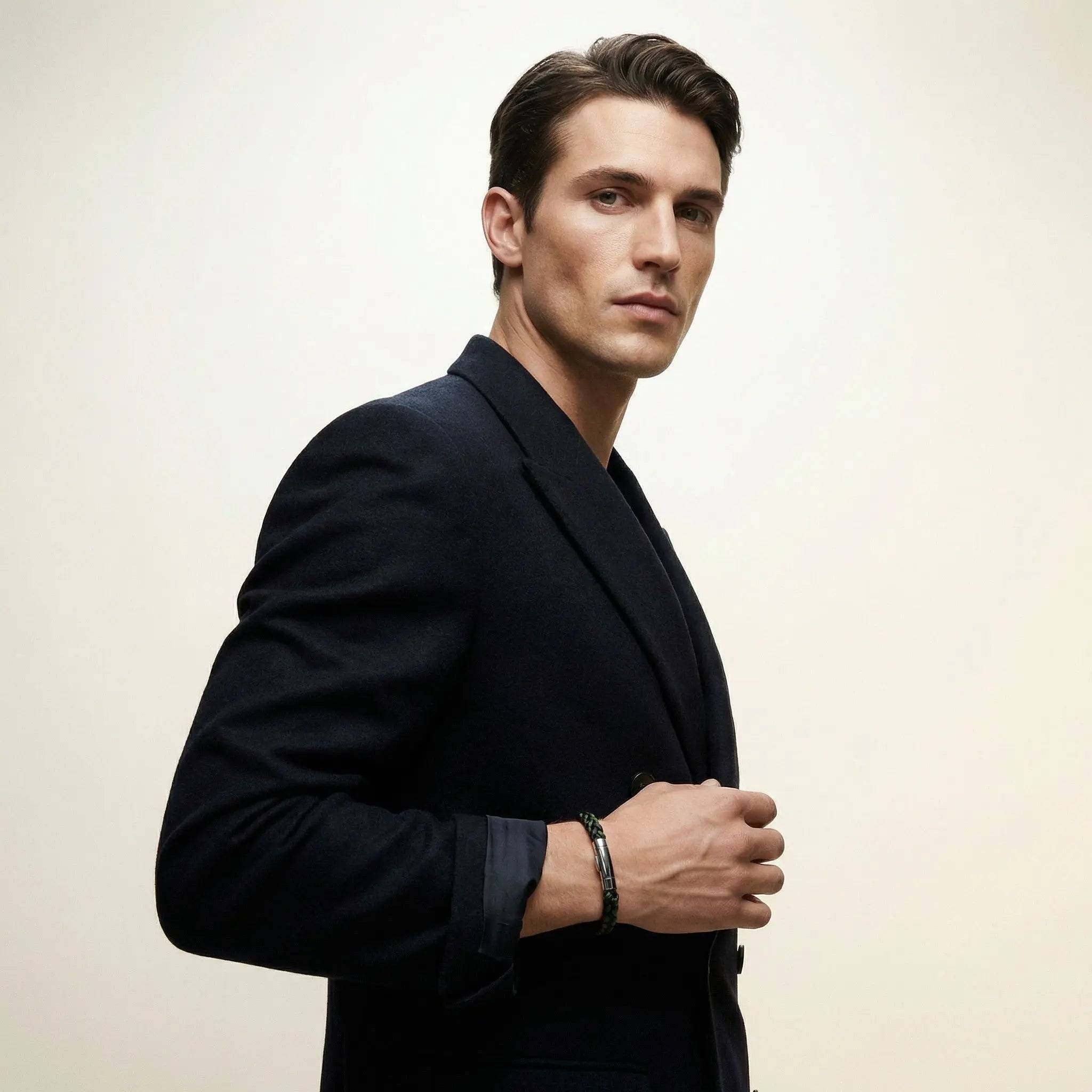 Male model wearing a braided leather bracelet - chestnut brown with forest green - handmade UK