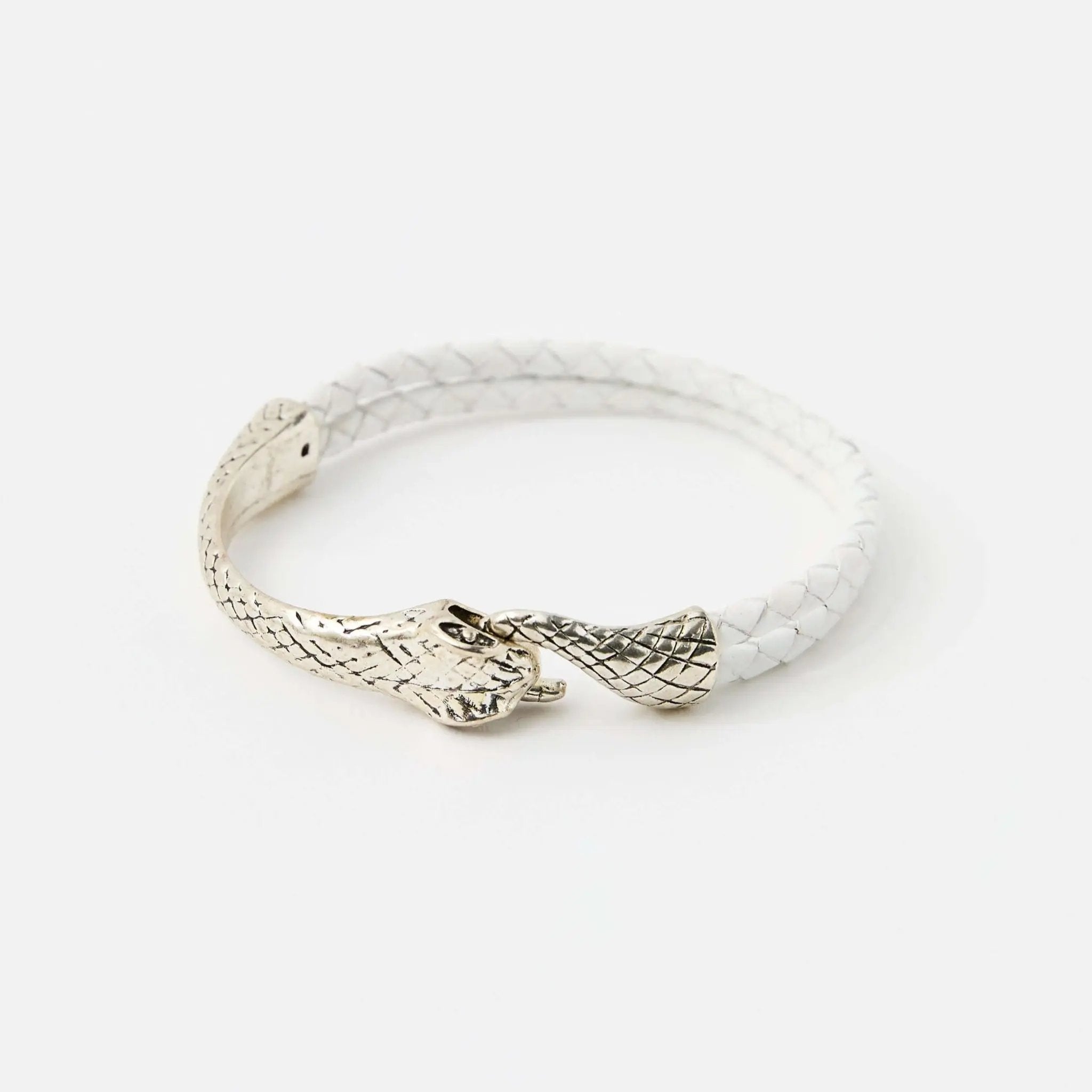Front view of a white braided leather bracelet with a silver snake head clasp, featuring intricate scale details and a sleek, minimalistic design.