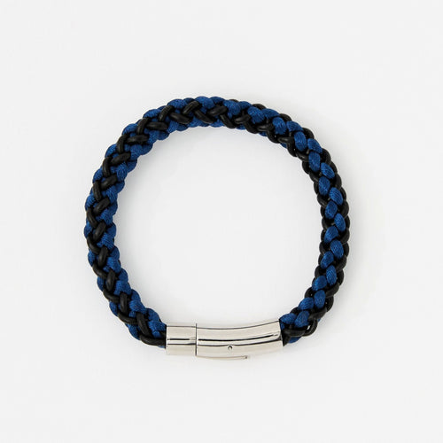 Braided blue and black bracelet with a silver clasp on a white background