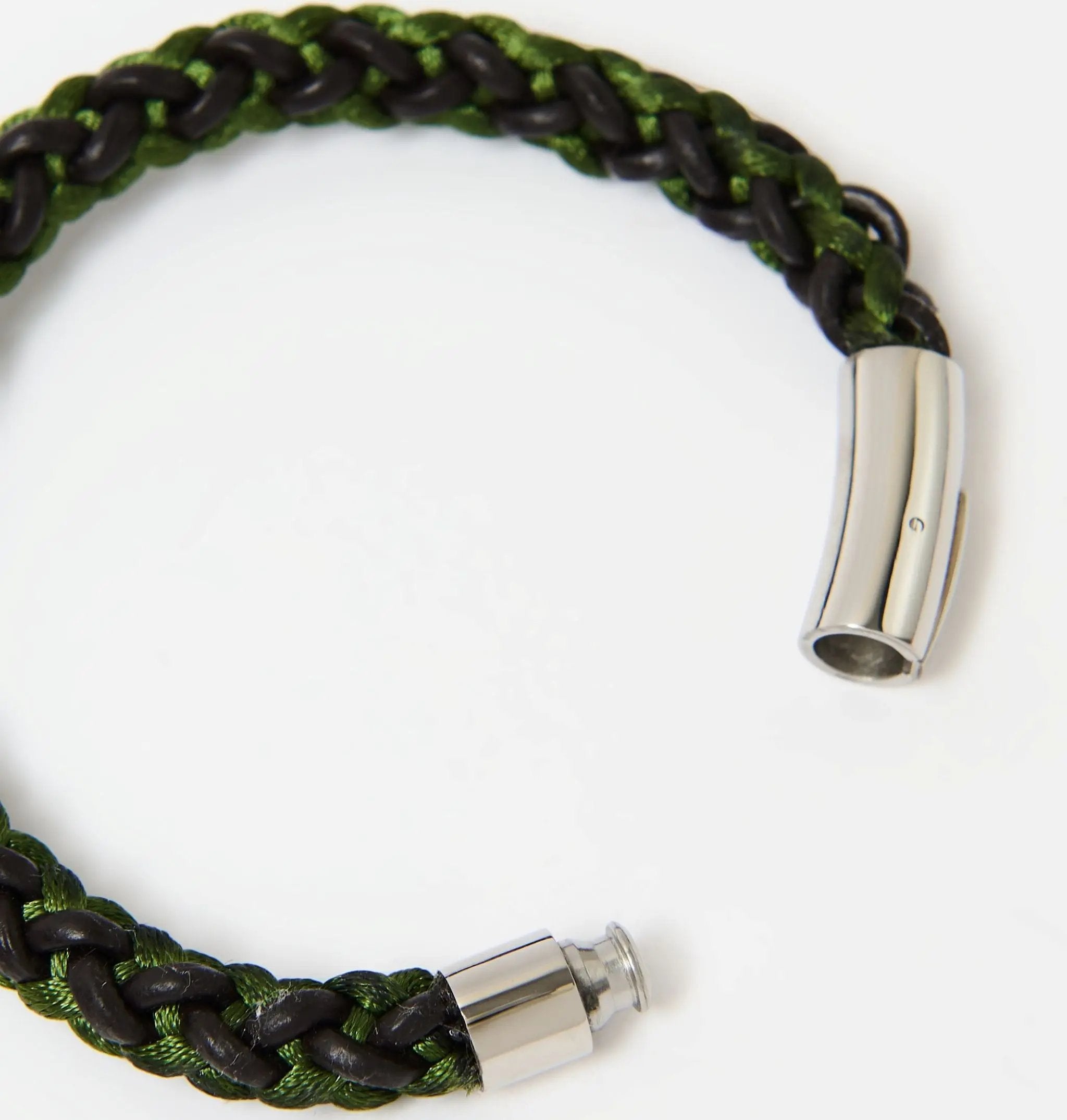 Detail view of green and brown braided leather bracelet for men featuring a polished stainless steel magnetic clasp — secure and stylish fastening design.