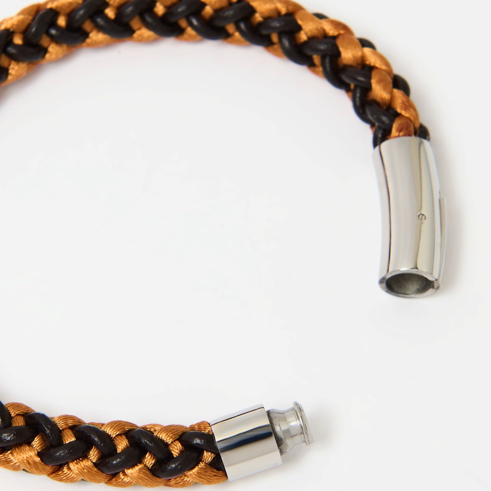 Detail view of orange and brown braided leather bracelet for men featuring a polished stainless steel magnetic clasp — secure and stylish fastening design.