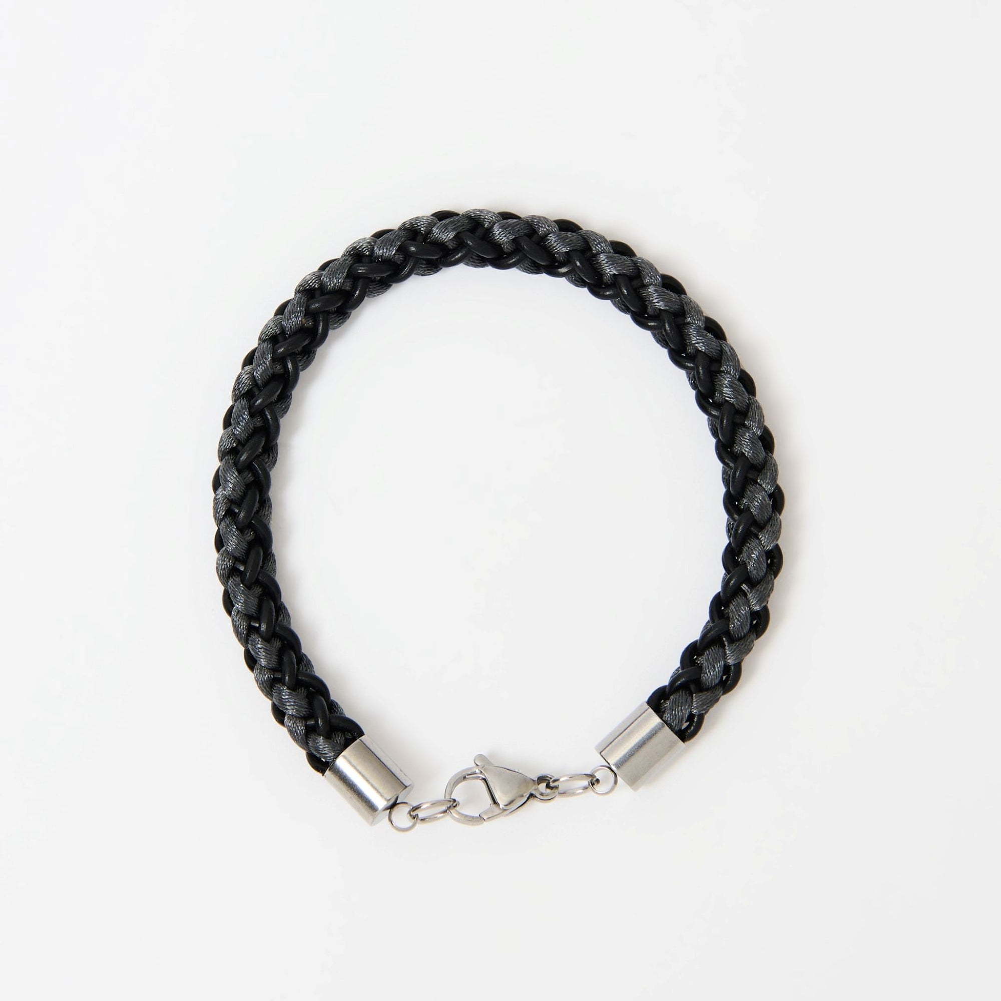 Men’s grey and black braided leather bracelet with silver lobster clasp — handcrafted masculine accessory, perfect gift for him.