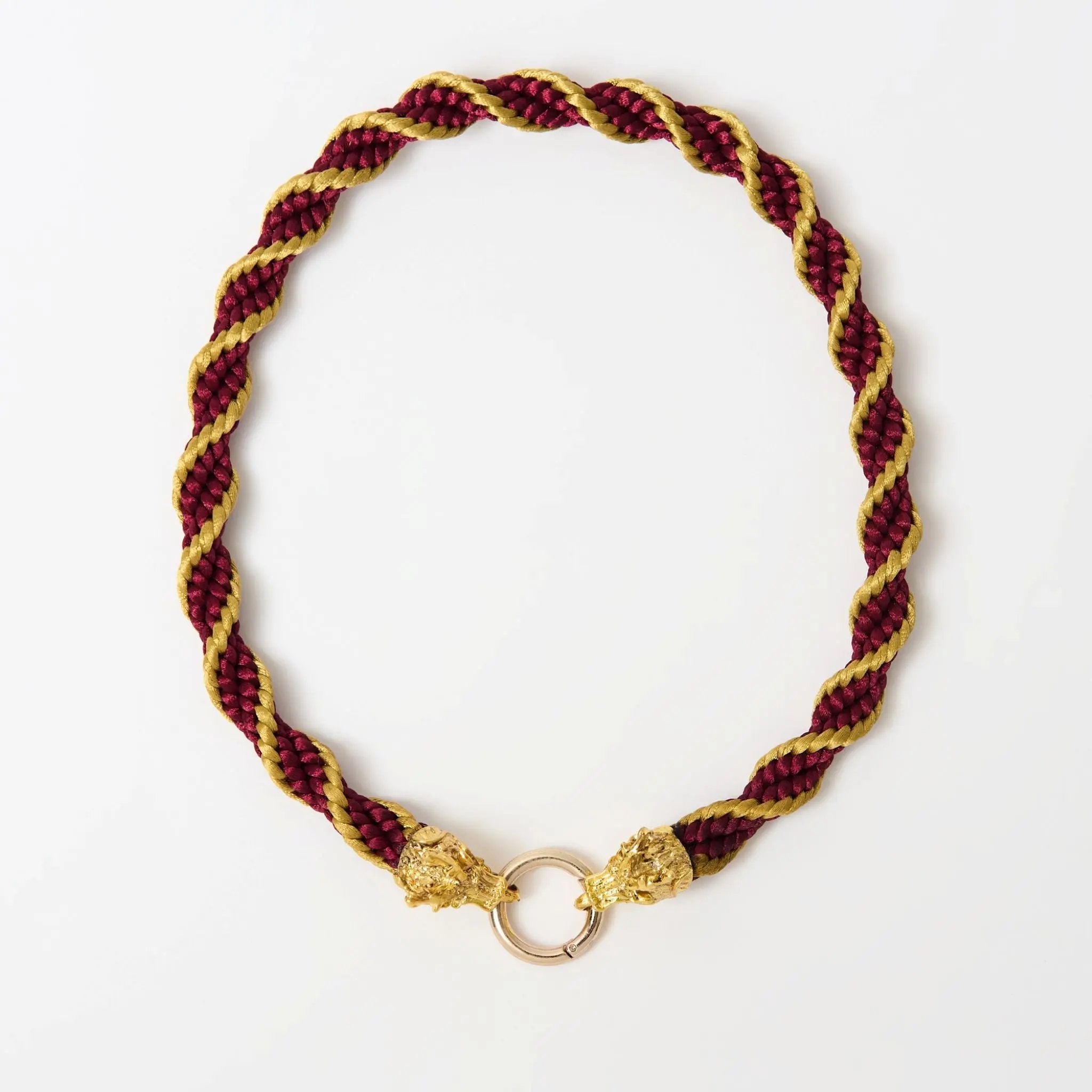 Handmade red and gold spiral satin dragon clasp necklace shown in a circular layout with central ring connector.