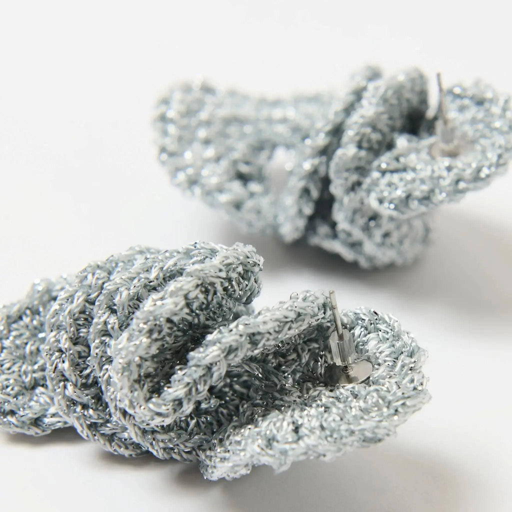 The Elara silver spiral dangle earrings, product close up — Lodorfo