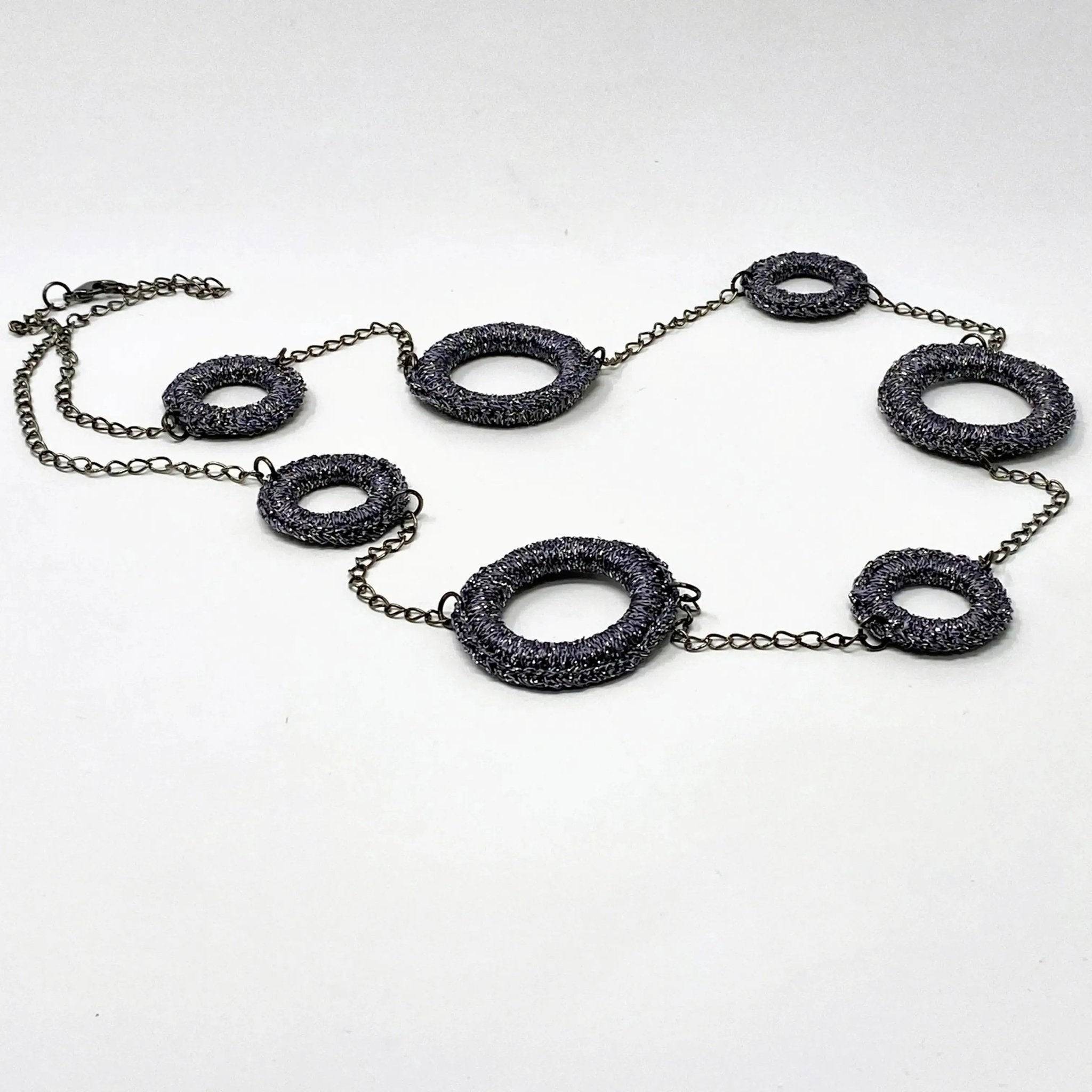 Handcrafted charcoal ring necklace with sculptural pendant, contemporary jewellery
