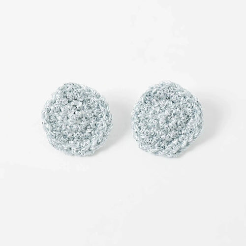 The Vela handcrafted disc earrings, product flat lay — Lodorfo